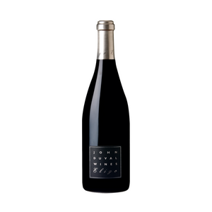 A bottle of John Duval Eligo Shiraz wine with a dark label and a silver foil cap.