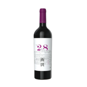A bottle of 2022 Xige Estate N28 Malbec wine with a purple cap and a label primarily in white and red, indicating the wine variety and vintage.